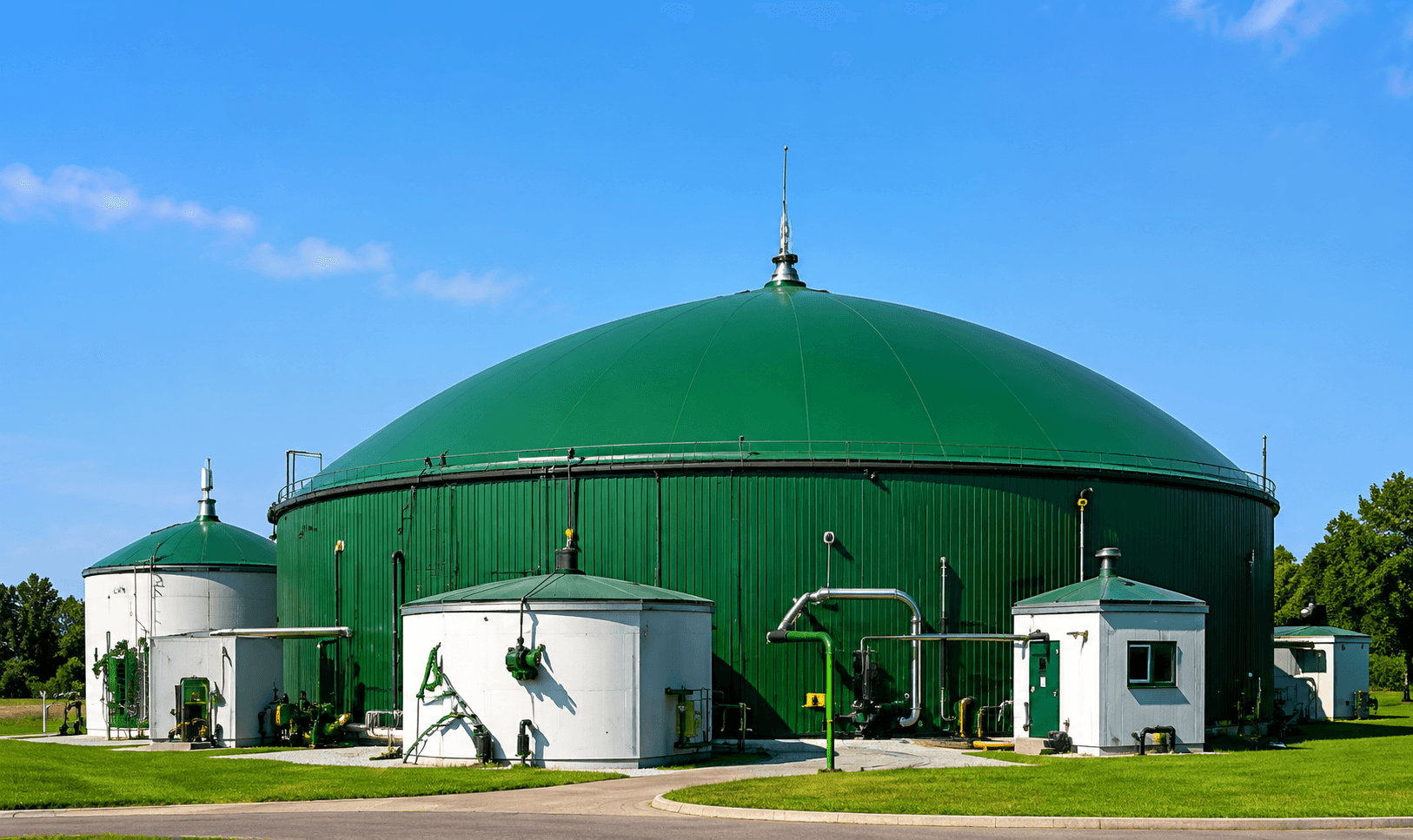Compressed bio-gas (CBG) plant with green domed digesters.